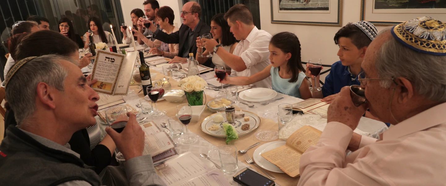 An Israeli family joins in the Passover seder last year on the first night of the Jewish holiday in Tzur Hadassah. Credit: Nati Shohat/Flash 90.