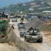 Israel Defense Forces vehicles drive over the Awali bridge as they retreat from Lebanon on the first day of stage one of the planned retreat, Feb. 16 1985. Photo by Yossi Zamir/Flash90.