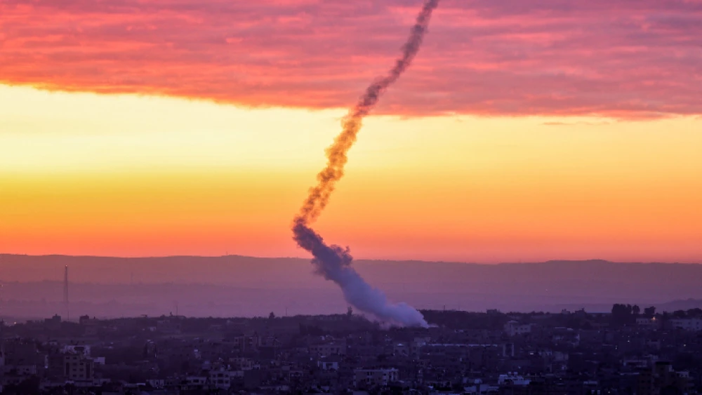 Trails of smoke are seen after rockets are fired from the Gaza Strip towards Israel, Feb. 23, 2023. Photo by Atia Mohammed/Flash90.