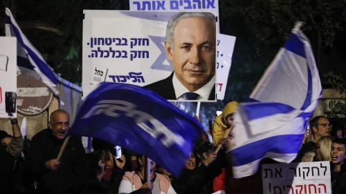 Supporters of Israeli Prime Minister Benjamin Netanyahu show their support outside the PM's residence in Jerusalem, November 23, 2019. Photo by Olivier Fitoussi/Flash90