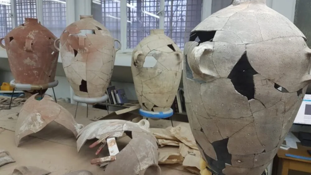 Ancient wine jugs are being restored in the laboratories of the Israel Antiquities Authority. Photo by Ortal Chalaf/restoration by Joseph Bocangolz.
