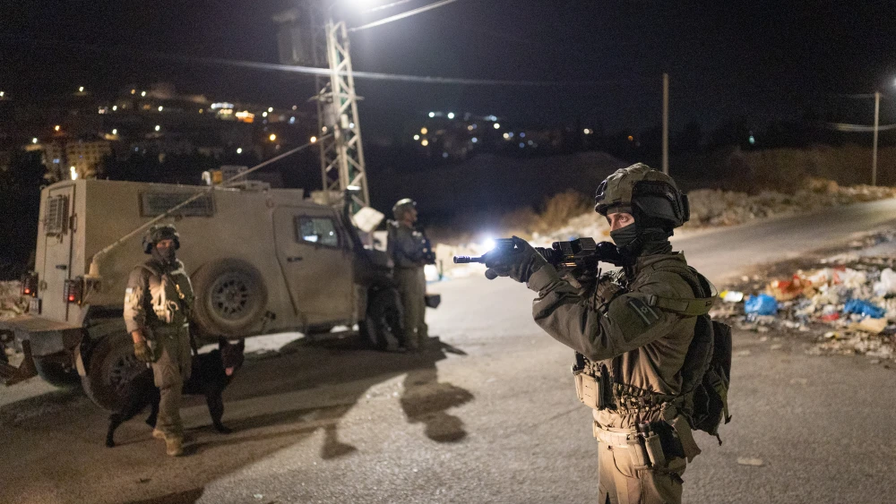 Officers of the Israel Prison Service Central Unit operate in the Samaria city of Shechem (Nablus) early on Sept. 3, 2026, seizing and destroying lathes suspected of being used to manufacture and repair weapons. Photo by Chaim Goldberg/Flash90.