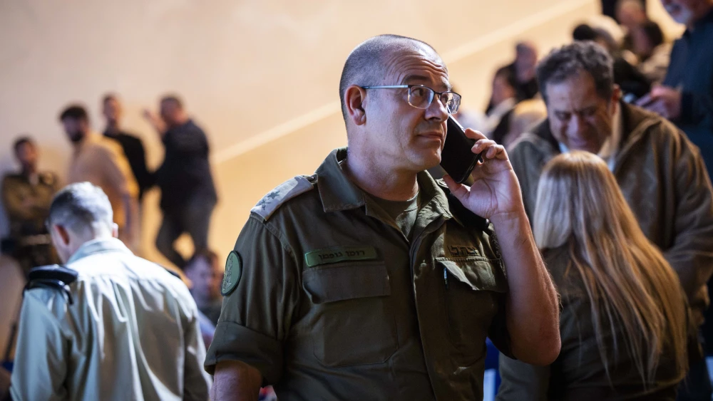 Israeli Defense Forces Maj. Gen. Roman Gofman, the incoming Mossad director, attends a ceremony at the National Library in Jerusalem marking the lighting of the first Chanukah candle of the 7th Armored Brigade, Dec. 14, 2025. Photo by Chaim Goldberg/Flash90.