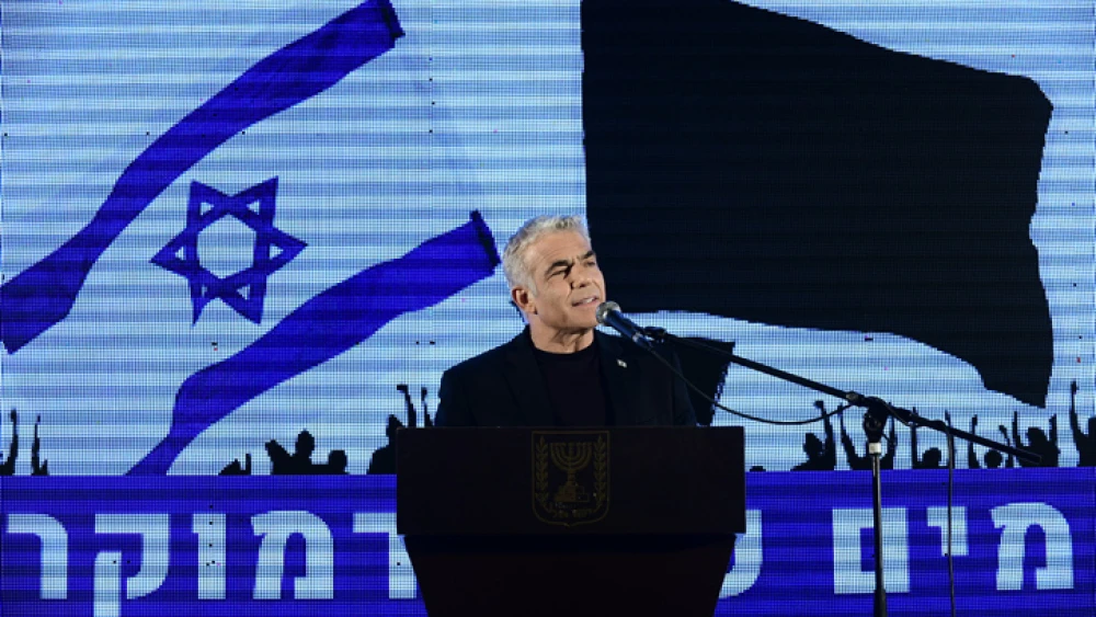 Knesset member Yair Lapid speaks during a protest against Israeli Prime Minister Benjamin Netanyahu, calling for him to quit, at Rabin Square in Tel Aviv on April 19, 2020. Photo by Tomer Neuberg/Flash90.