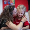 A mother kisses her daughter on the first day of school at Paula Ben-Gurion elementary school in Jerusalem on Sept. 1, 2019. Photo by Yossi Zamir/Flash90.