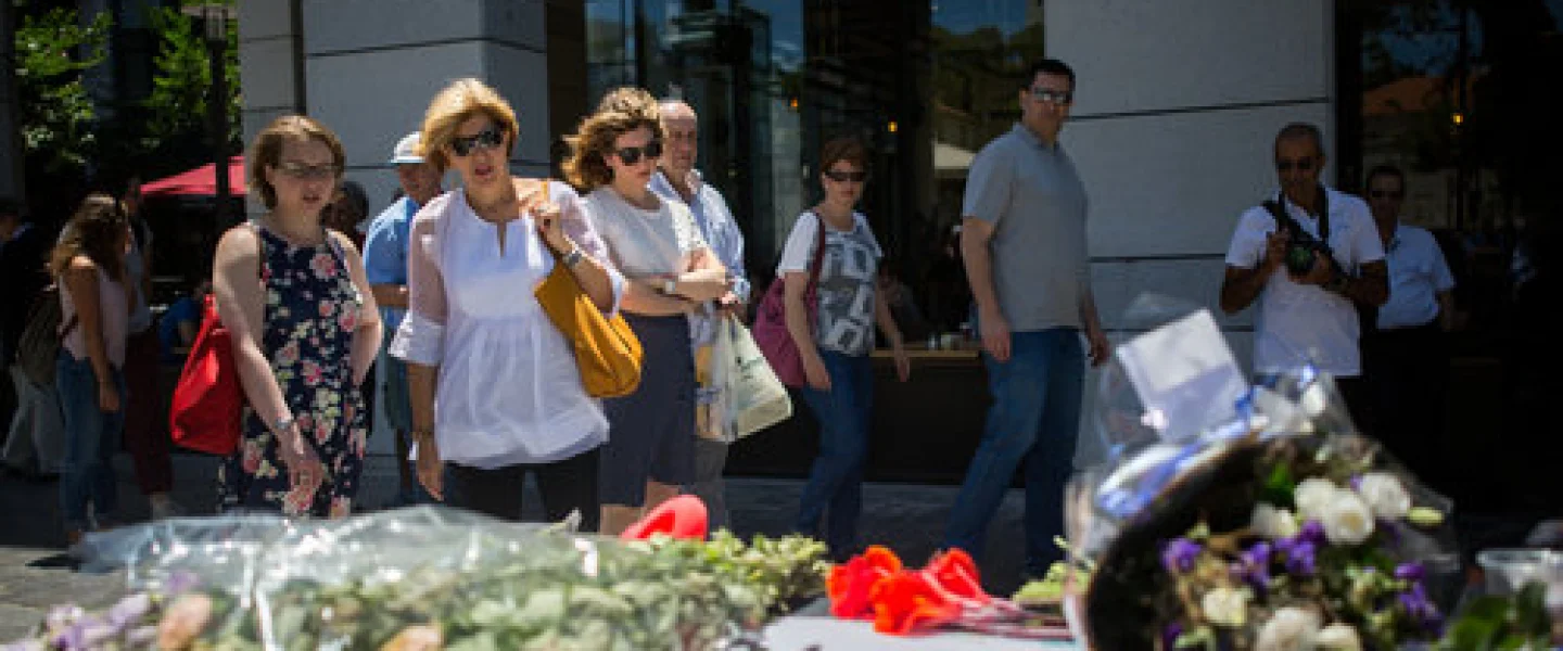 A makeshift memorial at the site of the June 2016 Palestinian terrorist shooting at Tel Aviv’s Sarona market. Four Israelis were killed in the attack. Credit: Miriam Alster/Flash90.