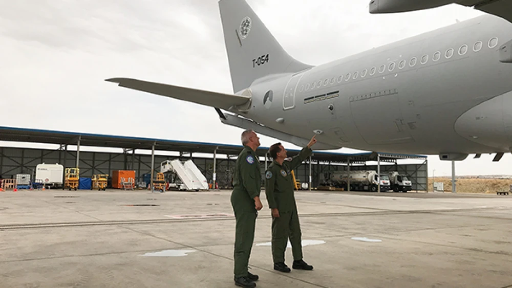 Pilots from the Multinational Multi-Role Tanker Transport Fleet check out an Elbit Systems J-MUSIC DIRCM turret. Credit: NSPA.