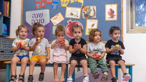 Children learn about the customs of Rosh Hashanah ahead of the Jewish New Year at a kindergarten in Moshav Yashresh in central Israel, Oct. 1, 2024. Photo by Yossi Aloni/Flash90.
