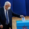 Israeli President Reuven Rivlin casts his ballot at a voting station in Jerusalem, during the Knesset elections, March 23, 2021. Photo by Olivier Fitoussi/Flash90.