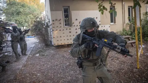 Israeli counter-terror forces patrol in Kibbutz Be'eri, near the Israeli-Gaza border in southern Israel. Oct. 22, 2023. Photo by Chaim Goldberg/Flash90.