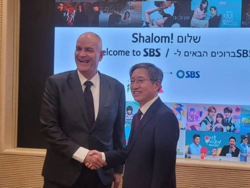 Rafi Harpaz, left, meets an interlocutor at an Israeli embassy event in Seoul, South Korea on March 26, 2025. Photo credit: Courtesy of the Israeli embassy in Seoul.
