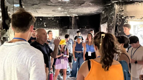 U.S. students visit Be'eri, Israel on Aug. 8, 2025. Courtesy of Hasbara Fellowships and IsraelAmbassadors.com.