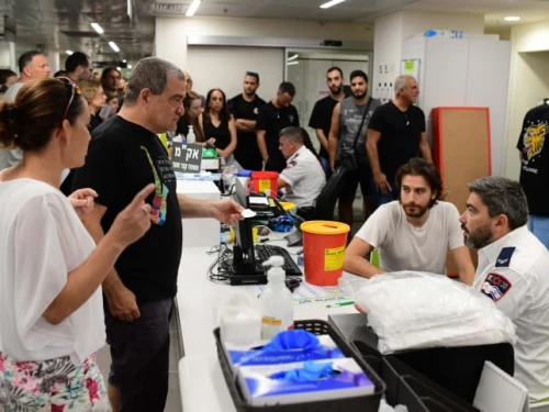 Hundreds in line at Tel Aviv Sourasky Medical Center (Ichilov Hospital) to donate blood for those wounded by a barrage of rockets fired by the Hamas terrorist group into Israel on Oct. 7, 2023. Photo by Tomer Neuberg/Flash90.