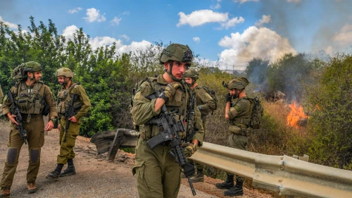 Israeli security forces at the scene where a missile fired from Lebanon hit an open area near the northern Israeli city of Kiryat Shmona, Sept. 4, 2024. Photo by Ayal Margolin/Flash90.