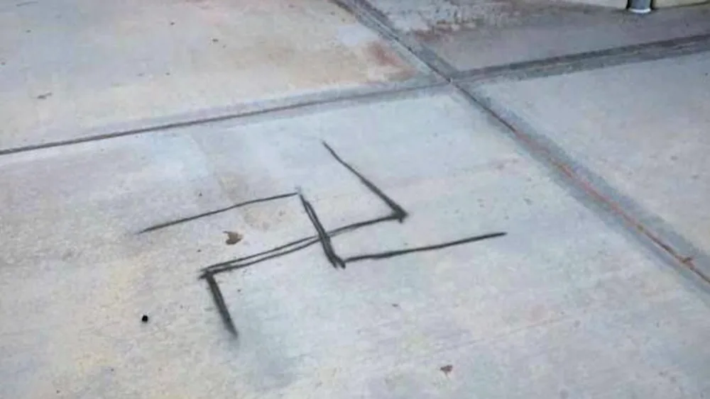 A spray-painted swastika was discovered on the concrete next to a baseball field at Dos Vientos Community Park in Conejo Valley, Calif., in 2019. Photo courtesy of the Anti-Defamation League Santa Barbara/Tri-Counties.