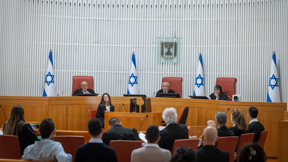 Supreme court justice Ofer Grosskopf arrives for a court hearing on a petition to convene the Judicial Selection Committee at the Supreme Court in Jerusalem, Feb. 12, 2026. Photo by Chaim Goldberg/Flash90.