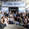 Young women volunteering in Israel's National Service pose for a photograph at the entrance to the new Nefesh B'Nefesh Bnot Sherut Bodedut Residence, Sept. 7, 2025. Photo by Yonit Schiller.