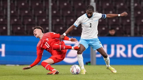 Rubén Vargas of Switzerland (left) against Eli Dasa of Israel during a UEFA EURO 2024 qualifying round group I match at Stade de Genève on March 28, 2023. Photo by Jari Pestelacci/Eurasia Sport Images via Getty Images.
