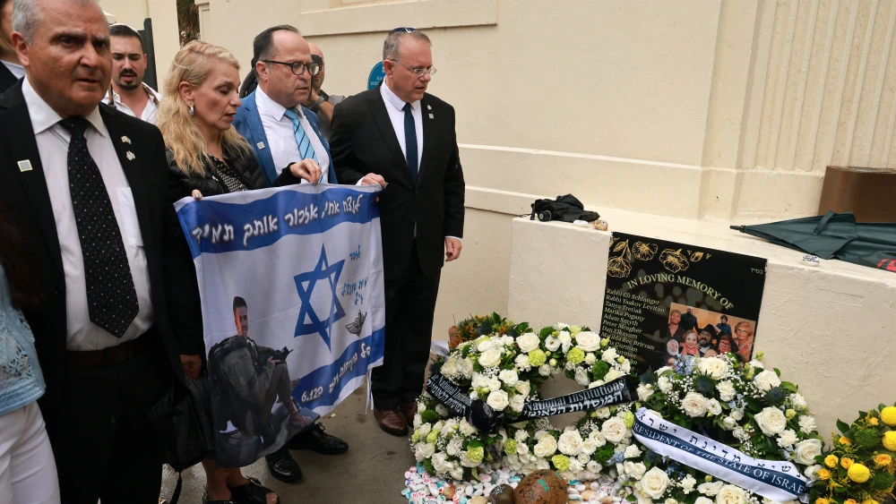 Members of the local Jewish community pay their respects after Israeli President Isaac Herzog laid a wreath for victims of the Dec. 14, 2025, gun attack at the Bondi Pavilion, in Sydney on February 9, 2026. Photo by David Gray/AFP via Getty Images.