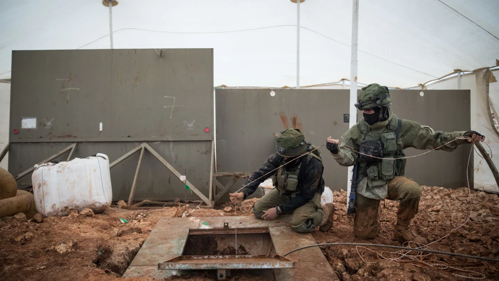 Israeli soldiers stand near a Hezbollah tunnel that crosses from Lebanon to Israel, on the border near Metula in northern Israel, on Dec. 24, 2018. Credit: Hadas Parush/Flash90.