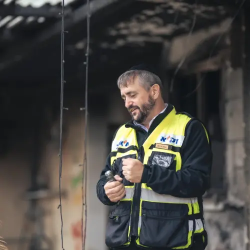 ZAKA volunteer Simcha Greiniman at the site of Hamas's Oct. 7 massacre. Photo courtesy of Simcha Greiniman.