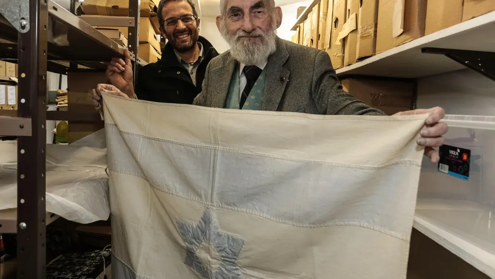 An Israeli flag created by Rebecca Affachiner, often called “the Betsy Ross of Israel,” donated to the Ben-Gurion Archives at the university’s Sde Boker Campus. Credit: American Associates, Ben-Gurion University of the Negev.