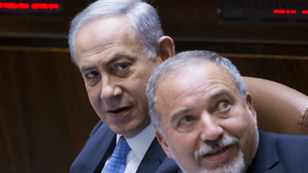 Israeli Prime Minister Benjamin Netanyahu and then-Defense Minister Avigdor Lieberman at the Knesset on June 1, 2016. Photo by Yonatan Sindel/Flash90.