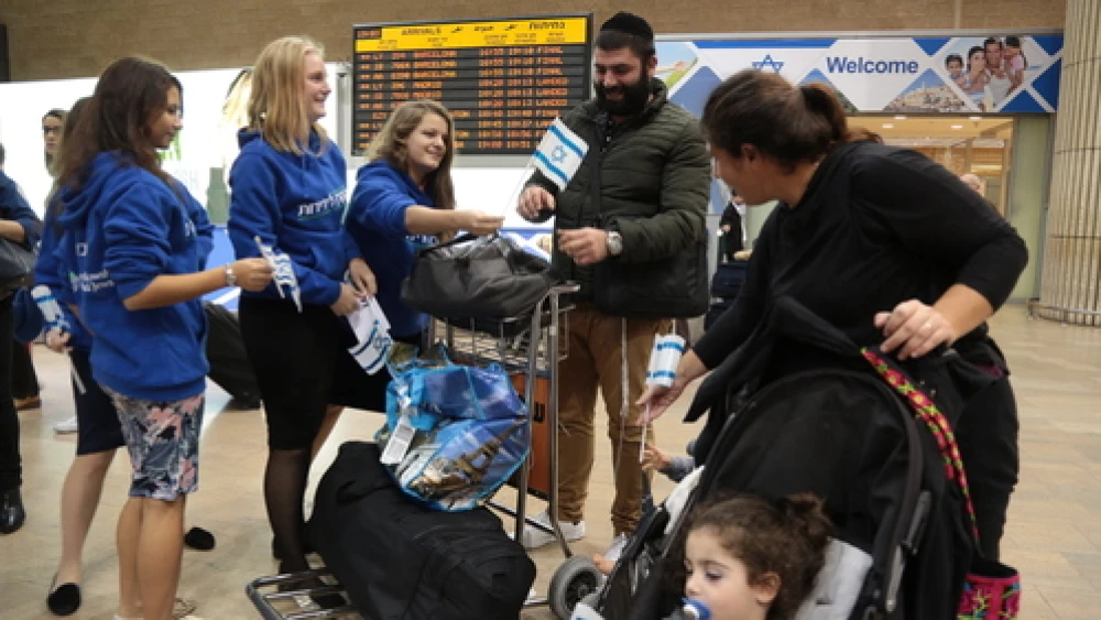 On Nov. 16, days after the Paris attacks, the Ventura Family arrives at Ben-Gurion Airport in Israel after moving out of France with the help of the International Fellowship of Christians and Jews. French Jewish aliyah has been on the rise and is now expected to experience a further uptick after the Paris attacks. Credit: Daniel Bar-On.