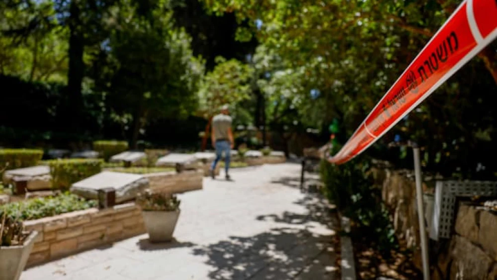 Police marking tape at Mount Herzl Military Cemetery, in Jerusalem, on June 30, 2023, where a letter threatening Israeli Prime Minister Benjamin Netanyahu found on the grave of his brother, Yoni Netanyahu earlier in the day. Photo by Flash90
