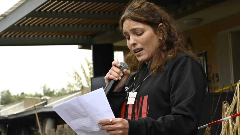 Released hostage Amit Soussana in front of her destroyed home in Kibbutz Kfar Aza, southern Israel, Jan. 29, 2024. Photo by Paulina Patimer.