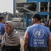 UNRWA officials at the site of an Israeli airstrike in the Nuseirat camp in the central Gaza Strip, July 15, 2024. Photo by Abed Rahim Khatib/Flash90.