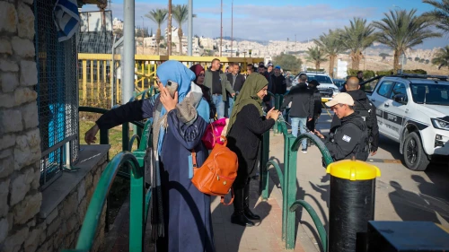 Palestinian workers line up at the entrance to the Israeli city of Ma'ale Adumim in Judea following an attempted stabbing attack, Feb. 23, 2023. Photo by Jamal Awad/Flash90.