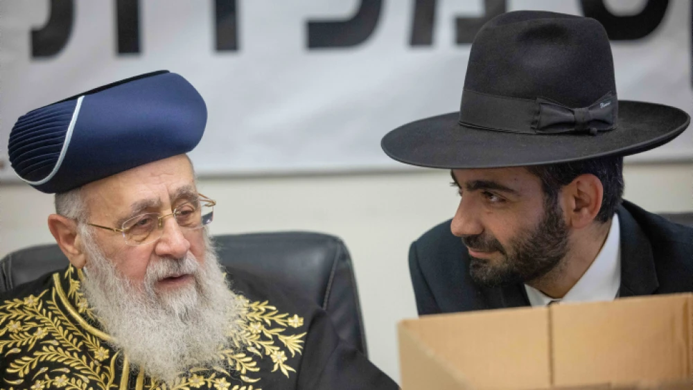 Sephardic Chief Rabbi Yitzhak Yosef (left) with Religions Services Minister Michael Michieli at a ceremony in Jerusalem selling the state's chametz, April 4, 2023. Photo by Yonatan Sindel/Flash90.