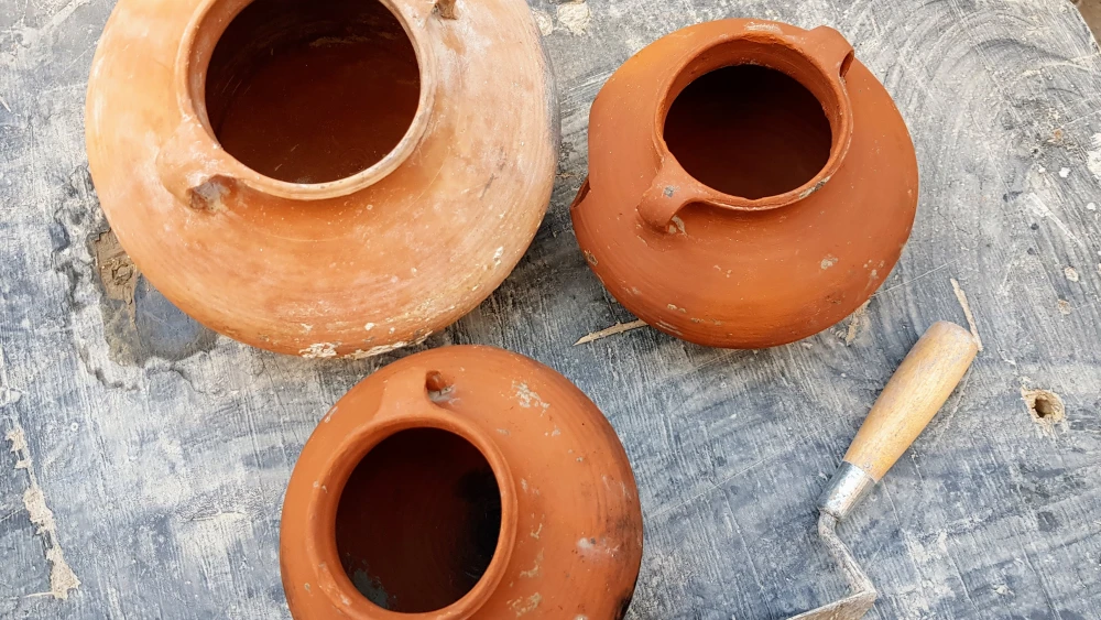 Intact Herodian-period cooking vessels collected from the bottom of the water cistern. Credit: Michal Haber/Hebrew University.