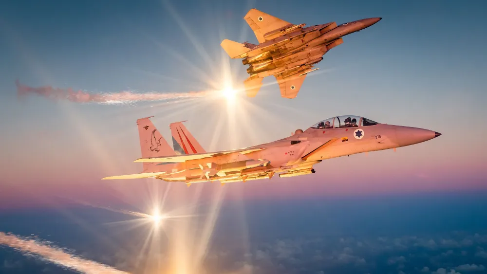 Two Israeli Air Force F-15 "Baz" fighter jets during operational activity. Credit: Israel Defense Forces.