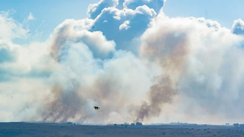 Smoke rises from a fire in the Golan Heights ignited by missiles fired from Lebanon, on Sept. 15, 2024. Photo by Ayal Margolin/Flash90.