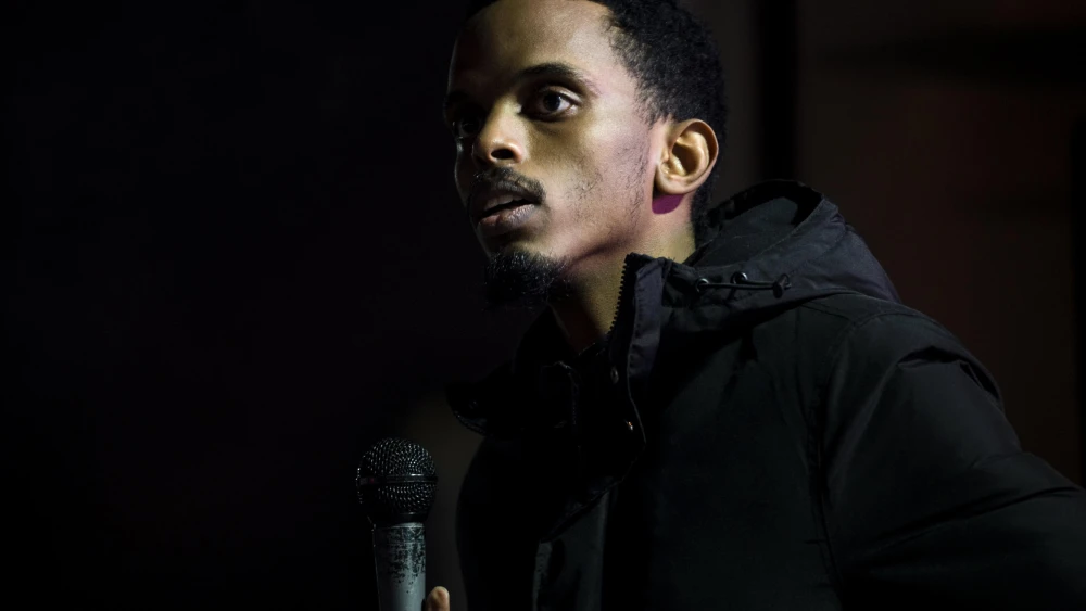 Omar Fateh, a member-elect of the Minnesota State Senate, speaks during a Dec. 31 vigil for Dolal Idd, a 23-year-old Somali-American man who was shot and killed by Minneapolis police on Dec. 30, 2020. Photo by Stephen Maturen/Getty Images.