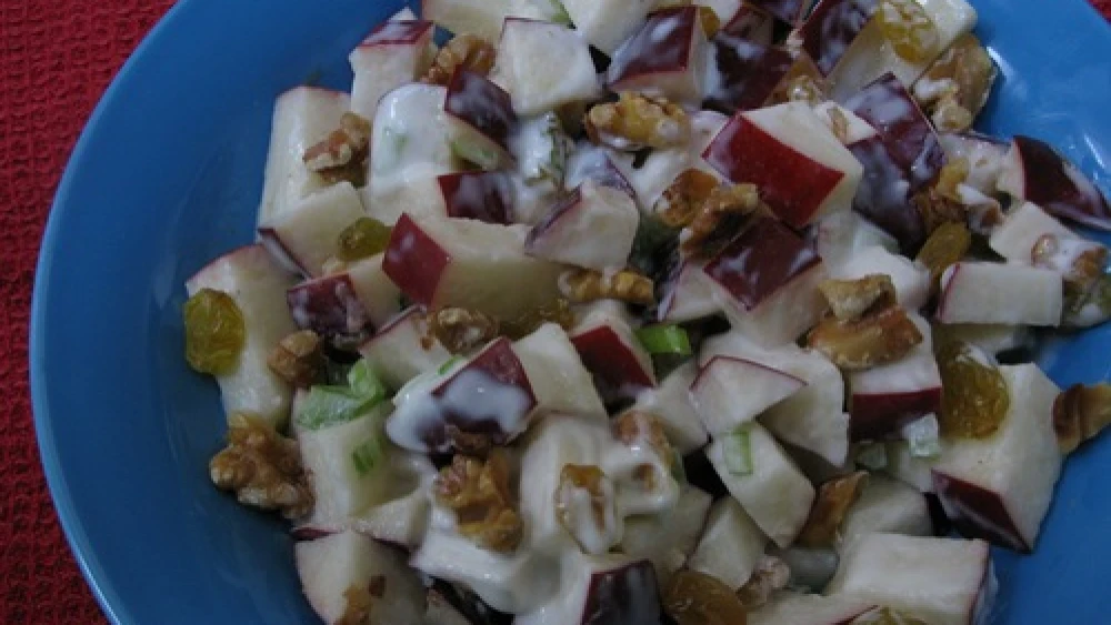 The Waldorf salad originated in the fanciest kitchen of the time, yet is a product of some of the most basic ingredients. The addition of apples is only one of many surprising ways you can include the fruit in unexpected recipes. Credit: Mollie Katzen.