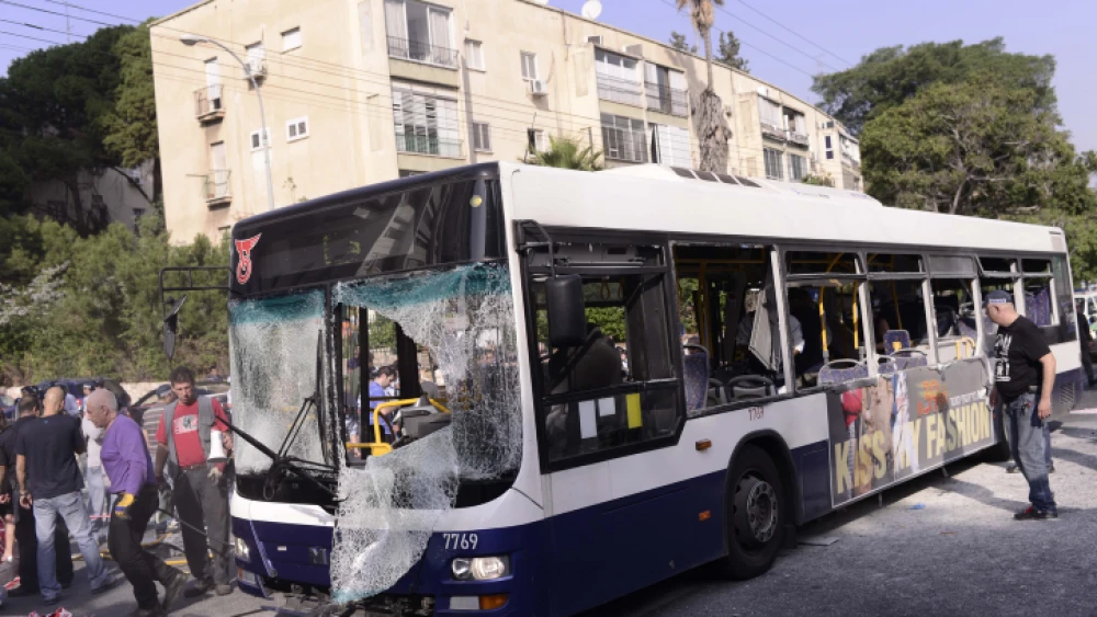 Israeli police and rescue personnel at the scene of a bombing on a Tel Aviv passenger bus on Nov. 21 2012 . Photo by Tomer Neuberg/ Flash90.
