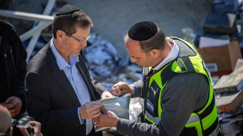 President Isaac Herzog visit at the scene where a ballistic missile fired from Iran struck Beit Shemesh, central Israel, causing extensive destruction and killing at least nine people, March 2, 2026. Photo by Yonatan Sindel/Flash90.