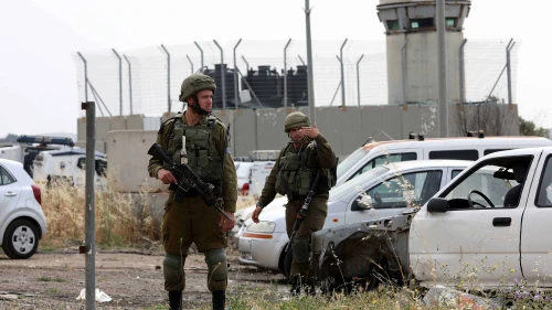 Israeli soldiers at the scene of a car-ramming attack in the Hebron Hills, May 14, 2020. Photo by Wisam Hashlamoun/Flash90.