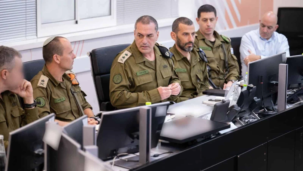 OC Home Front Command Maj. Gen. Shai Klapper (second from left) and Israel Defense Forces Chief of Staff Lt. Gen. Eyal Zamir (third from left) at Home Front Command headquarters in Ramle, March 8, 2026. Credit: IDF.