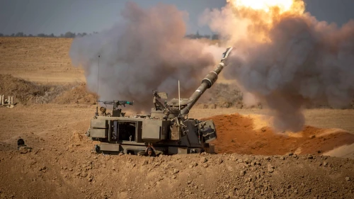 An IDF artillery unit fires into the Gaza Strip, Oct. 15, 2023. Photo by Oren Ben Hakoon/Flash90.