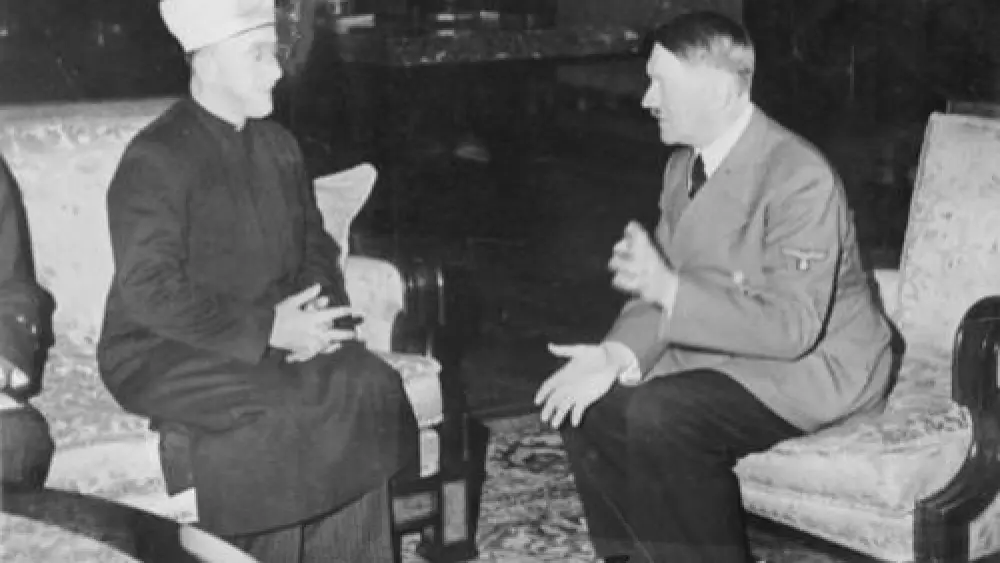 The Mufti of Jerusalem, Haj Amin al-Husseini, meets with Adolf Hitler in 1941. Credit: German Federal Archives via Wikimedia Commons.