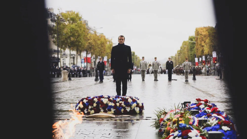 French President Emmanuel Macron paying his respect to fallen French soldiers from World War I. Source: Emmanuel Macron via Twitter.