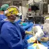 Dr. Cezar J. Mizrahi combines augmented reality and robotic technology to operate on a patient with a complex spinal fracture. Credit: Shaare Zedek Medical Center.