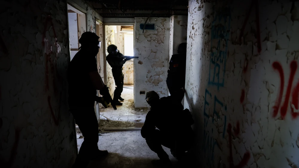 Members of an Israeli emergency squad take part in a military drill at an abandoned hotel in Safed, northern Israel, on June 7, 2024. Photo by David Cohen/Flash90.