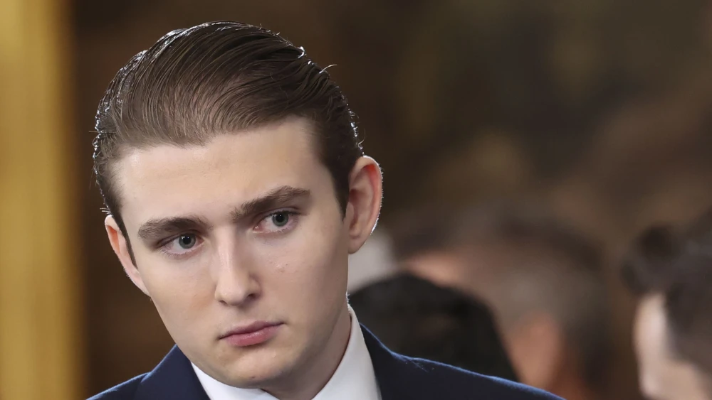 Barron Trump, the youngest son of U.S. President Donald Trump, attends inauguration ceremonies in the U.S. Capitol Rotunda on Jan. 20, 2025 in Washington, DC. Photo by Kevin Lamarque/Pool/Getty Images.