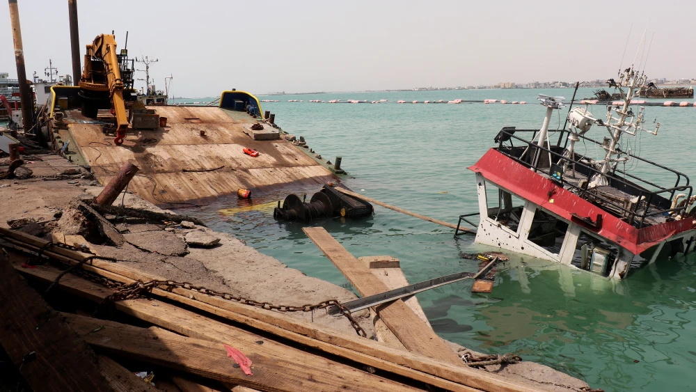 The navigation bridge of a sunken vessel at the surface of the water in the Port of Mokha the day after an attack by the Houthis on the city of Mokha, held by Yemen's internationally recognized, Aden-based government, on Aug. 10, 2026. Photo by Khaled Ziad/AFP via Getty Images.