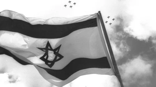 Israeli fighter jets fly over the nation's flag on Independence Day celebrations in 1957. Photo by Moshe Pridan/Government Press Office.